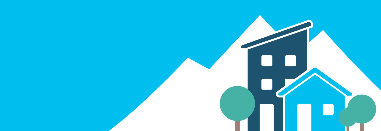 Blue house and apartment building in front of mountains.