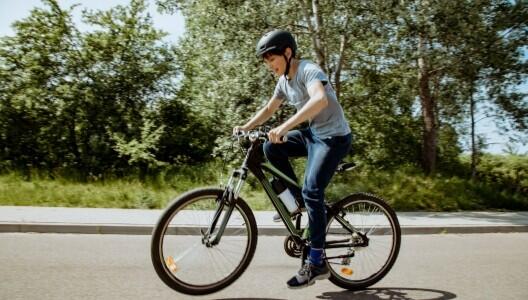 Teen riding an e-bike