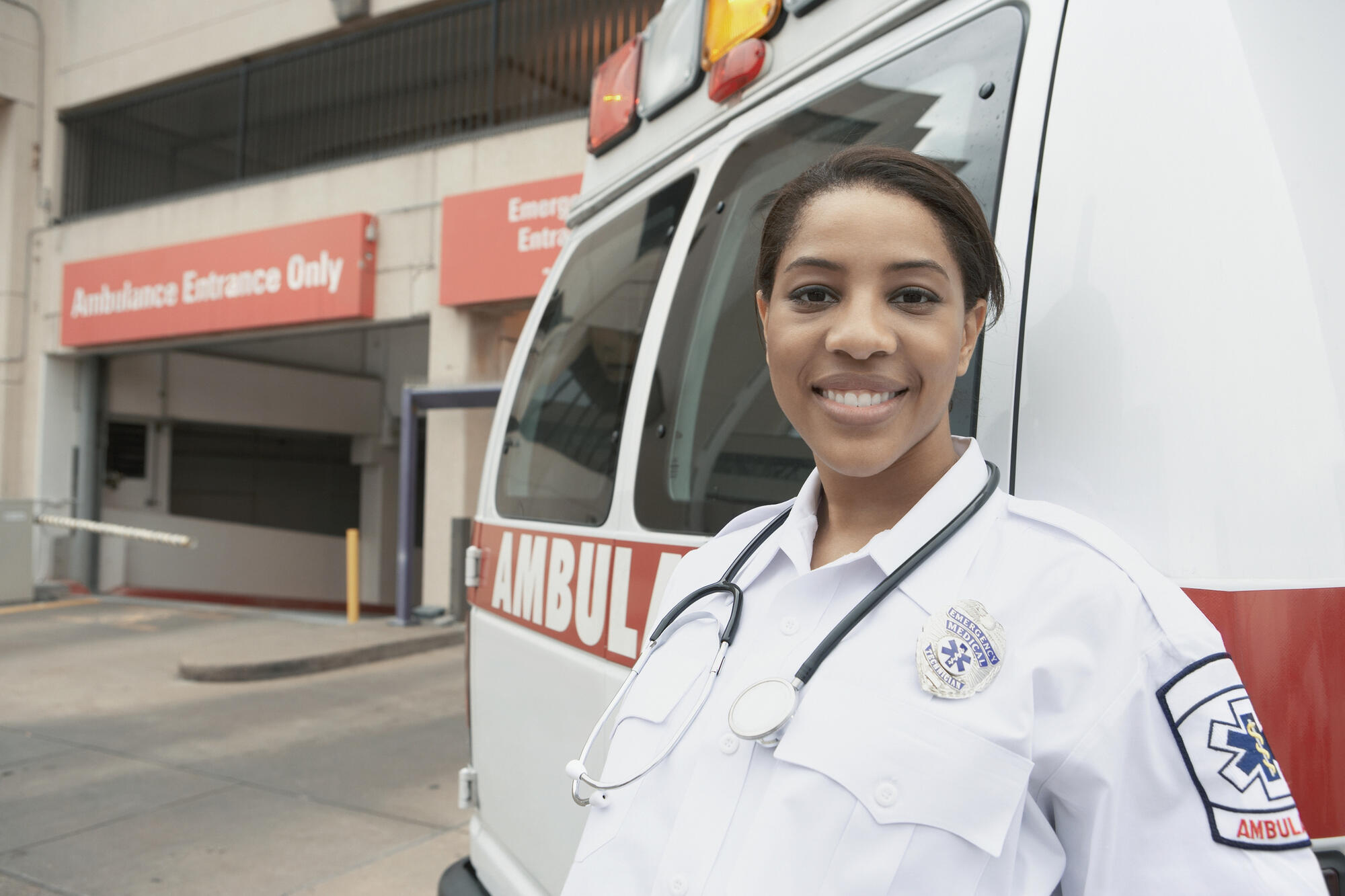 EMT outside of a hospital and an ambulance